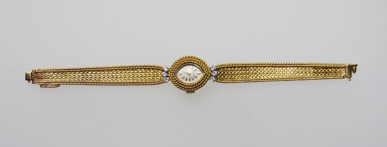 Lady's Yellow Gold Diamond Movado Movement Wristwatch