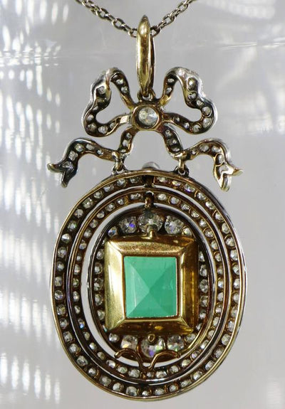 4 Carat Colombian Emerald Diamond Platinum-Topped Gold Pendant. Circa 1910