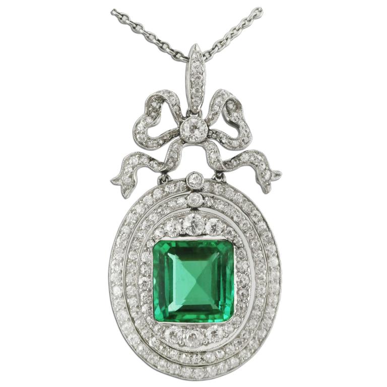 4 Carat Colombian Emerald Diamond Platinum-Topped Gold Pendant. Circa 1910
